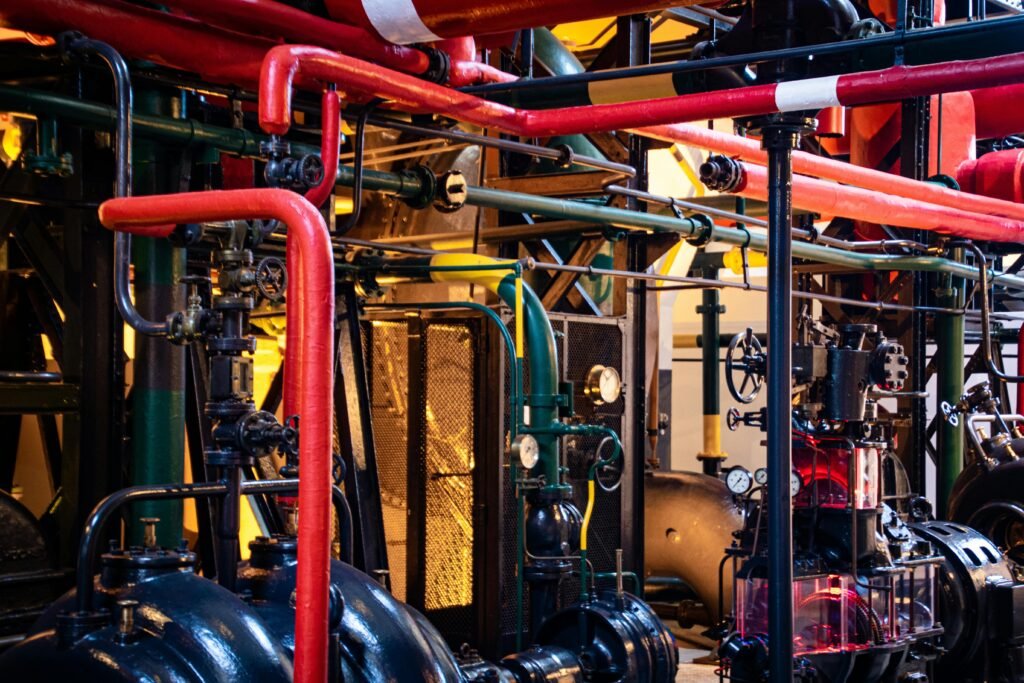 Rotating Complex network of industrial pipes and machinery inside a Lisbon plant.